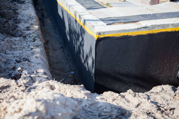 Professional Waterproofing technician working in Dover, OH